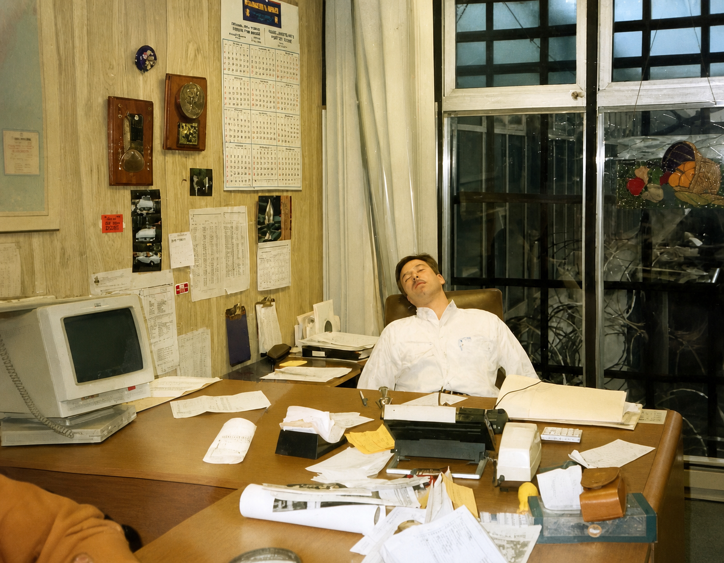 Ira Nathel sleeping at his desk